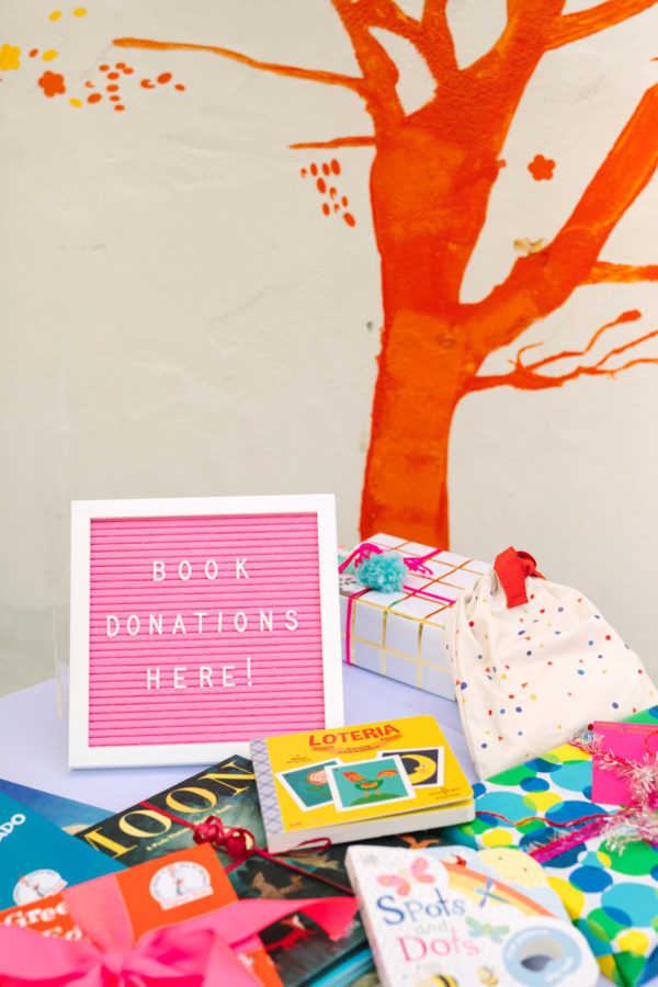 Pink sign next to presents