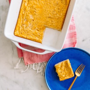 Cheddar egg Bake on table with plate