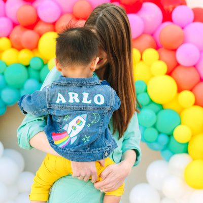 Rainbow balloons and people