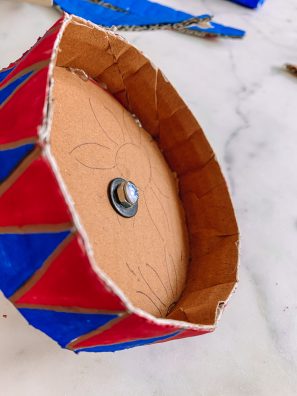 A close up of a cardboard toy