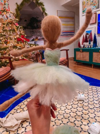 A doll wearing a dress