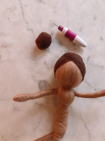 A doll being made