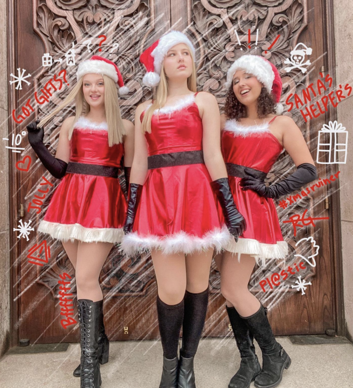 Three girls dressed as Santa's helpers from the Mean Girls movie. 